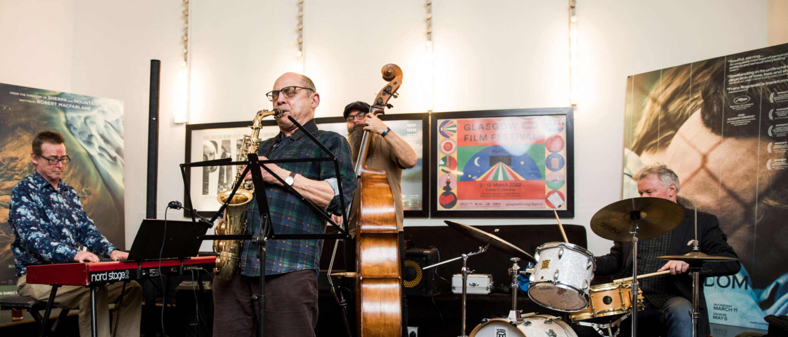 A Jazz band perform in a foyer.