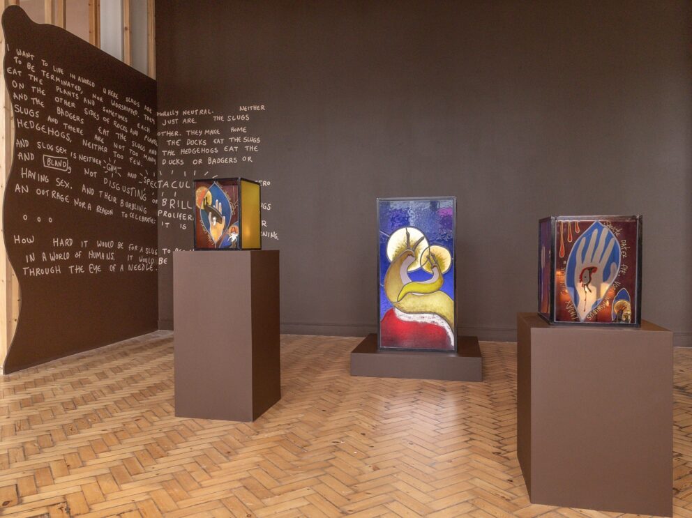 An installation view of Abi Palmer's exhibition Slime Mother, featuring stained glass sculptures on plinths